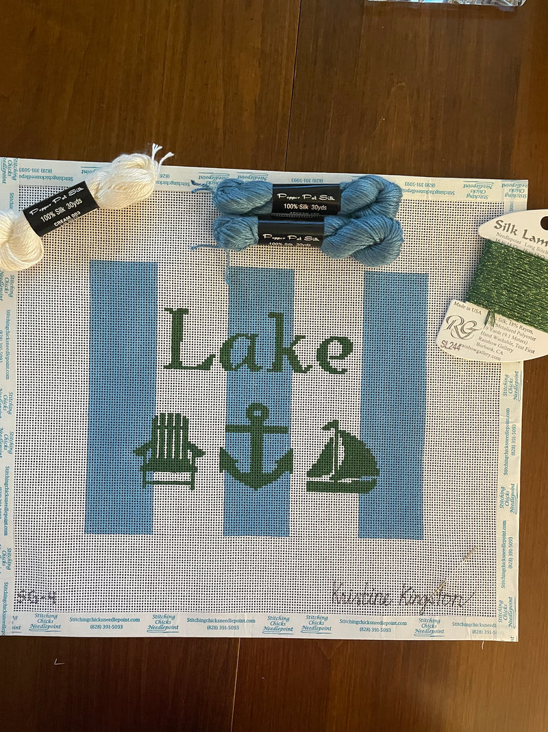 Lake with Adirondack chair, anchor, and sailboat  Kit