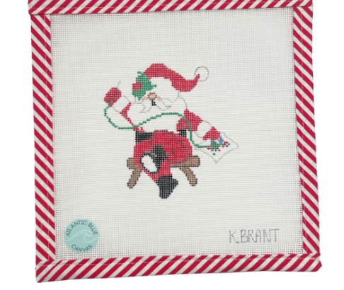 Needlepointing  Santa