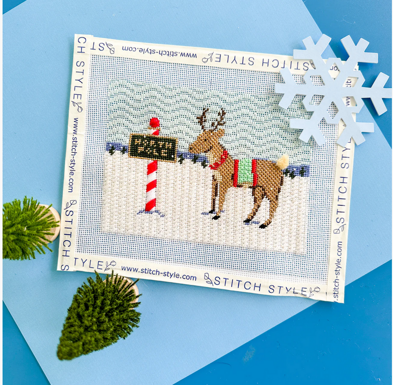 Reindeer and North Pole Sign