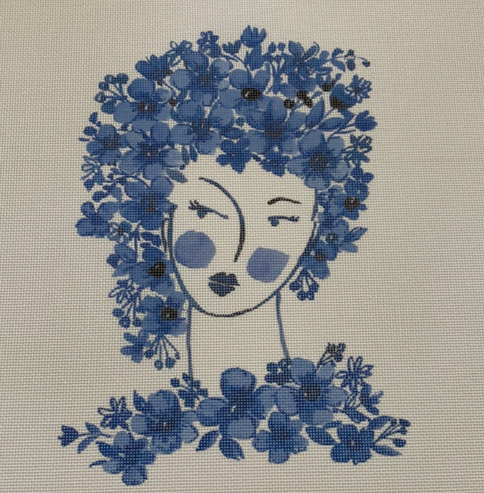 Head with blue flowers