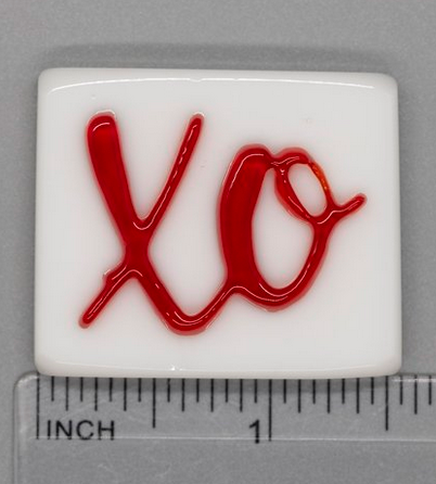 XO on White Needle Minder
