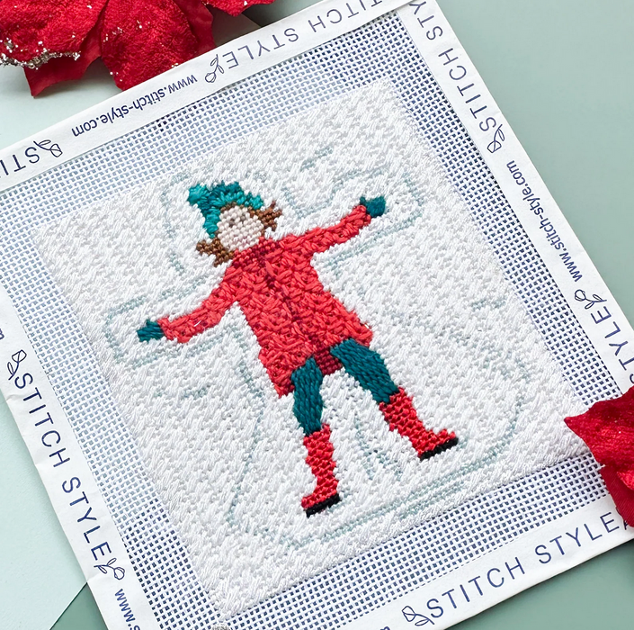 Winter Village - Girl Making Snow Angel