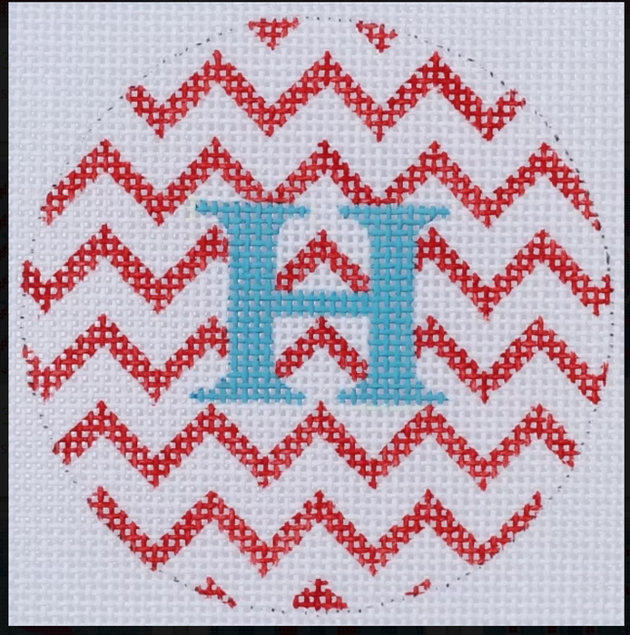 Bright Disk Letter – Red & White Zigzag, Bright Blue Letter